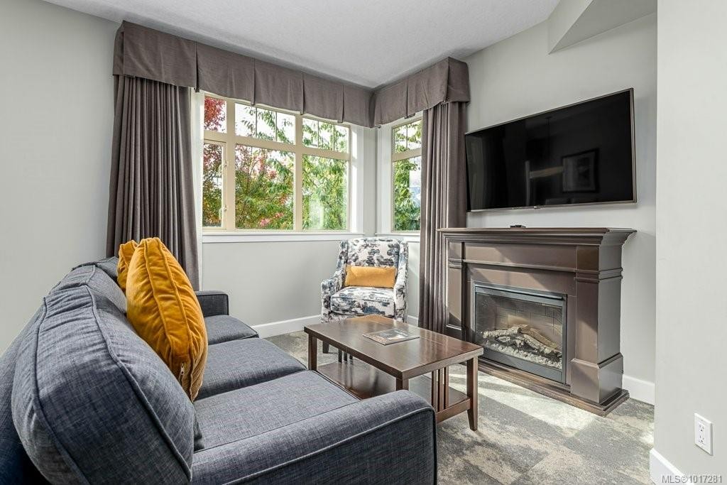 211A-1730 Riverside Lane, Courtenay, BC - Indoor Photo Showing Living Room With Fireplace