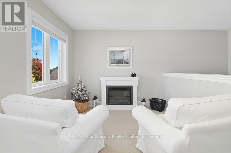 3 - 132 East Ridge Drive, Blue Mountains, ON - Indoor With Fireplace