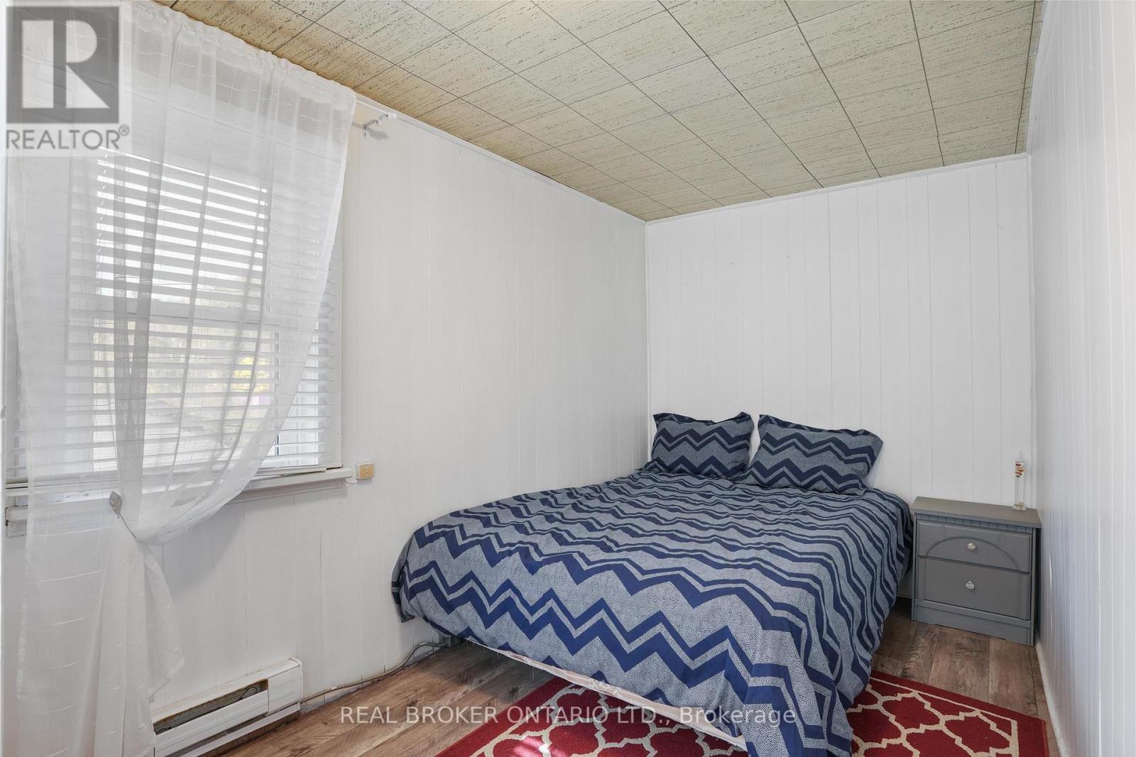 79 & 85 Bridge Street, Addington Highlands, ON - Indoor Photo Showing Bedroom