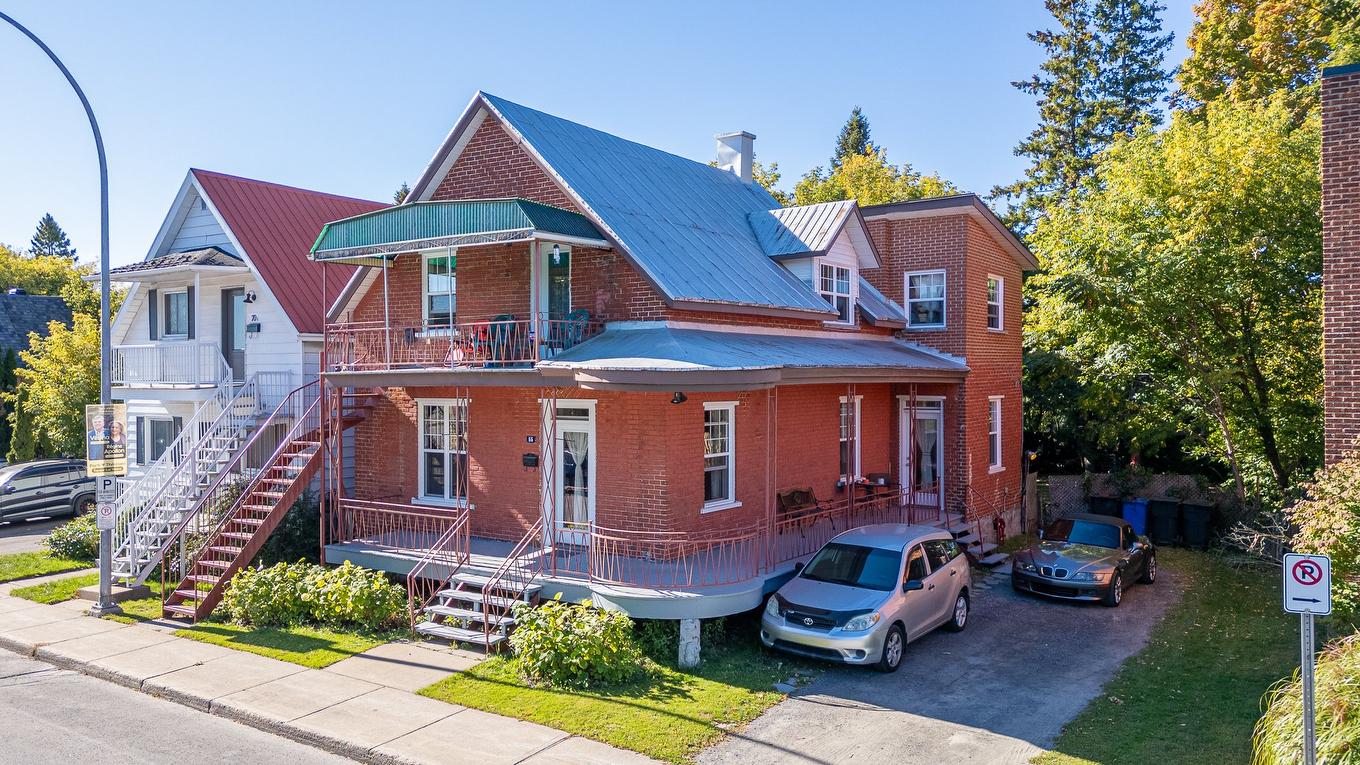Frontage - 66 - 68 Rue St-Joseph, Sainte-Thérèse, QC - Outdoor With Deck Patio Veranda With Facade