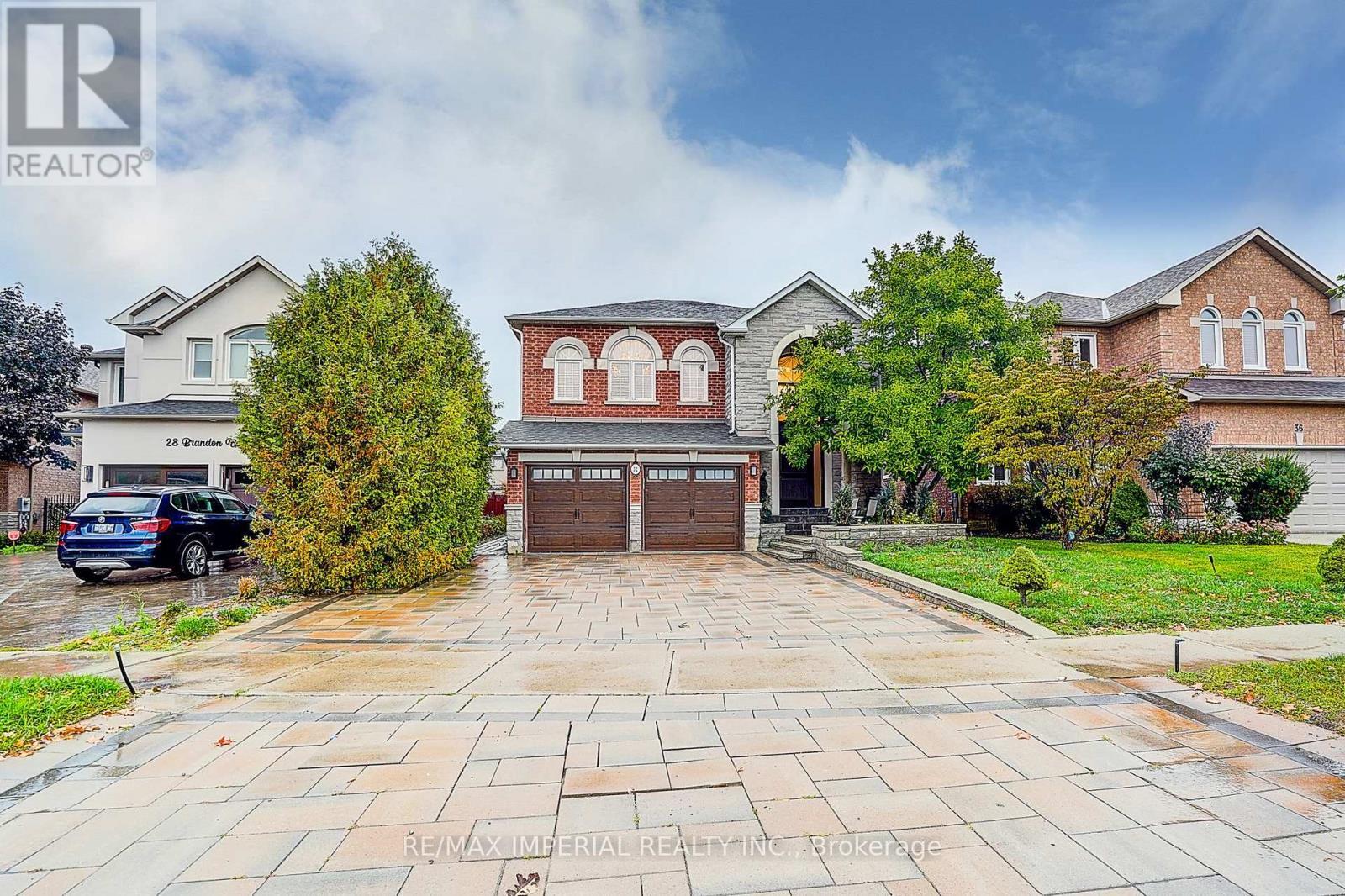 32 Brandon Gate Drive, Vaughan, ON - Outdoor With Facade