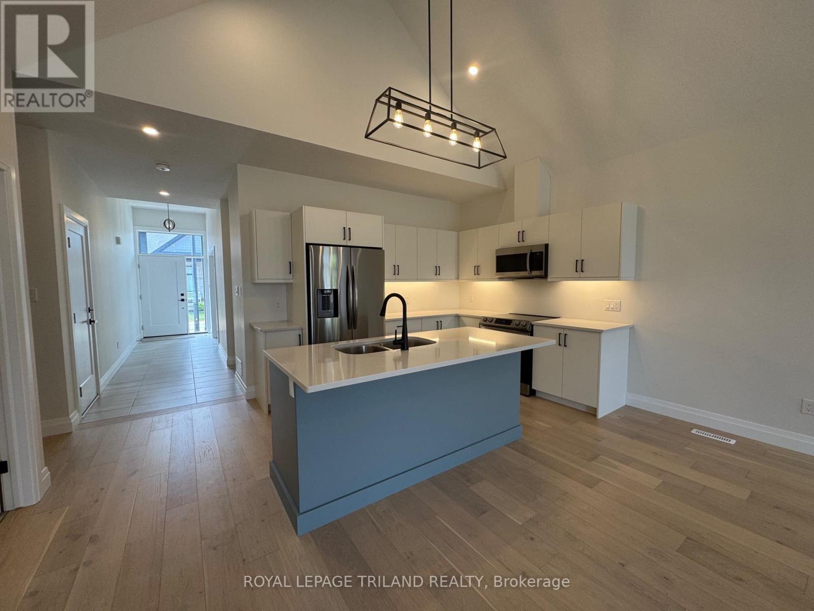 49 - 63 Compass Trail, Central Elgin, ON - Indoor Photo Showing Kitchen With Double Sink With Upgraded Kitchen