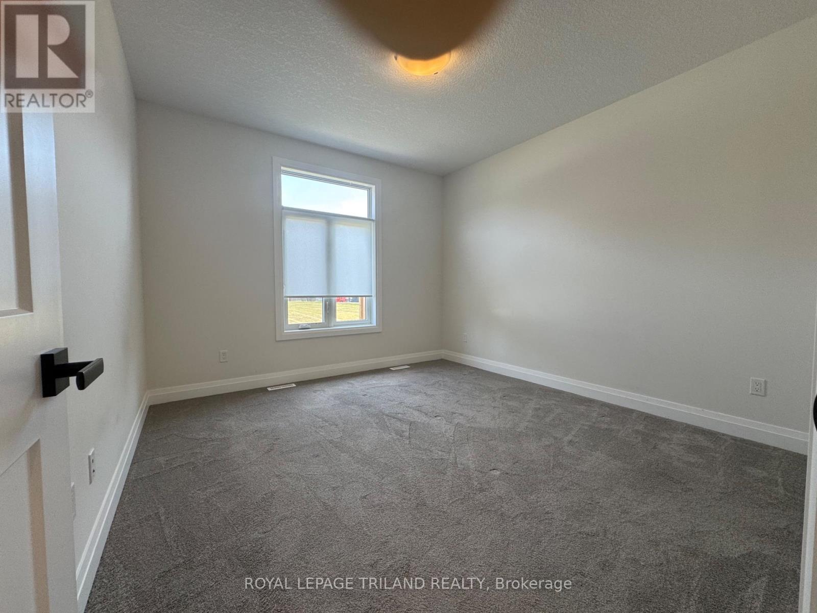 49 - 63 Compass Trail, Central Elgin, ON - Indoor Photo Showing Other Room