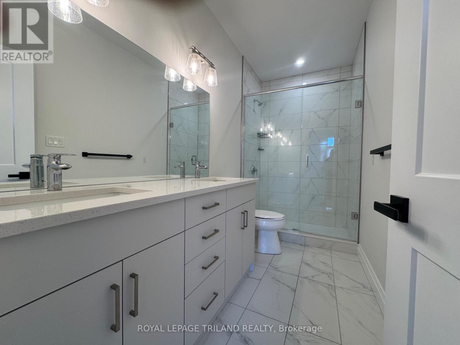 49 - 63 Compass Trail, Central Elgin, ON - Indoor Photo Showing Bathroom