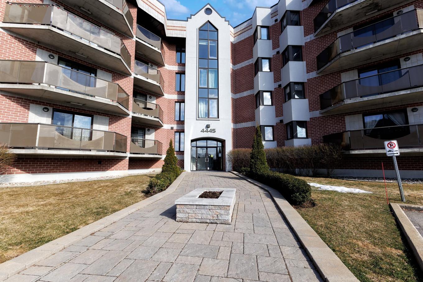 Exterior - 411-4445 Boul. St-Jean, Dollard-Des-Ormeaux, QC - Outdoor With Facade