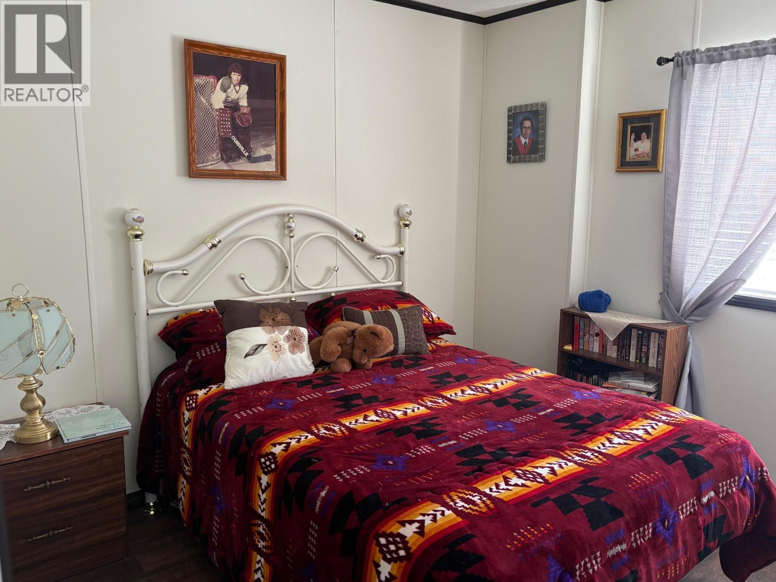 54 208 8Th Street, 100 Mile House, BC - Indoor Photo Showing Bedroom