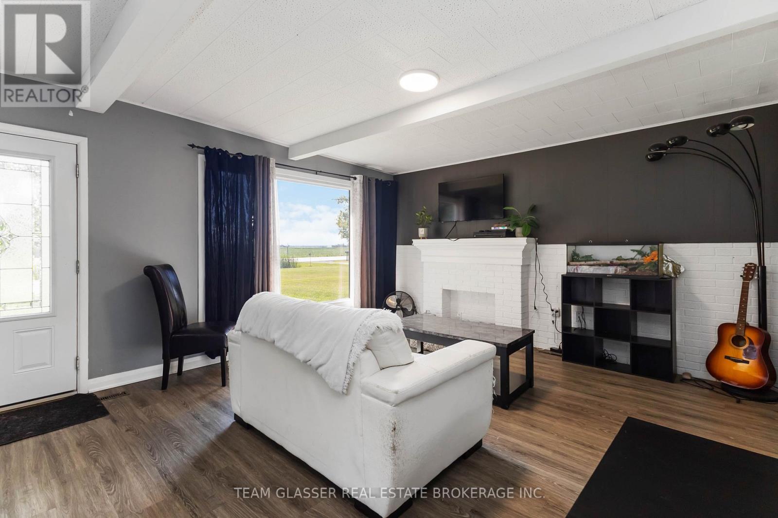 11241 Imperial Road, Malahide, ON - Indoor Photo Showing Other Room With Fireplace