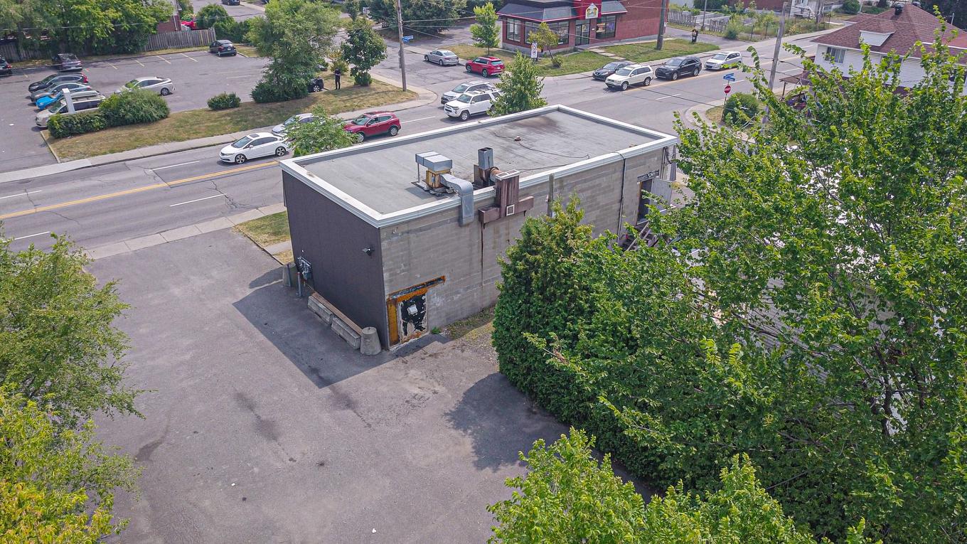 Back facade - 1169 Boul. Curé-Poirier O., Longueuil (Le Vieux-Longueuil), QC - Outdoor With View