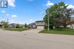 concrete driveway parking for 4 + plus 2 car garag -