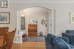 Arched pillared entry into living room -