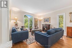 Arched and tall windows plus crown molding -