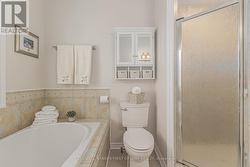 Bathroom oversized shower with two shower heads -