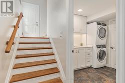 Newer oak staircase to lower level -