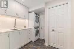 Lower level laundry room, ceramic in-floor heating -