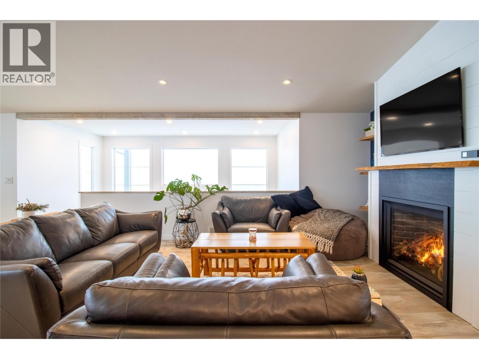 2521 Panoramic Way, Blind Bay, BC - Indoor Photo Showing Living Room With Fireplace