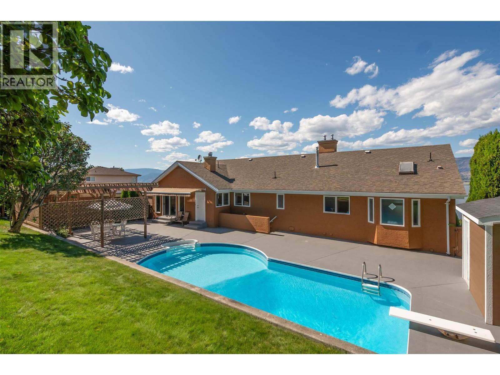 343 Stellar Drive, Kelowna, BC - Outdoor With In Ground Pool With Deck Patio Veranda