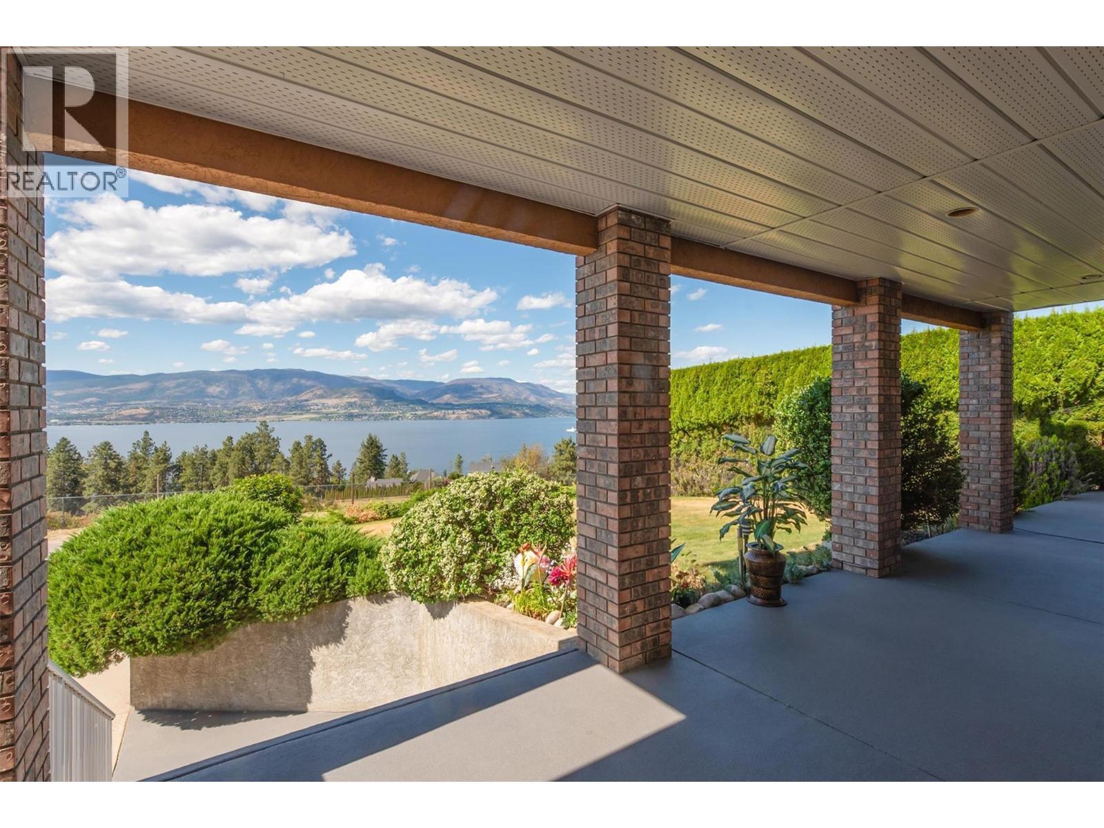 343 Stellar Drive, Kelowna, BC - Outdoor With Body Of Water With Deck Patio Veranda