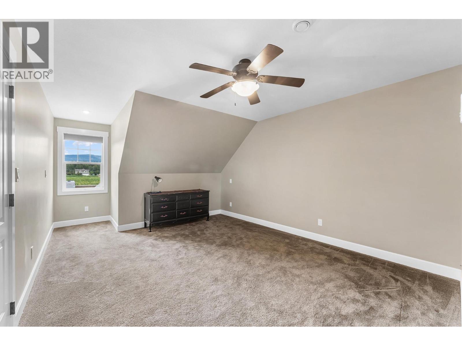 Upstairs Bedroom 2 - 3550 Benvoulin Road, Kelowna, BC - Indoor Photo Showing Other Room