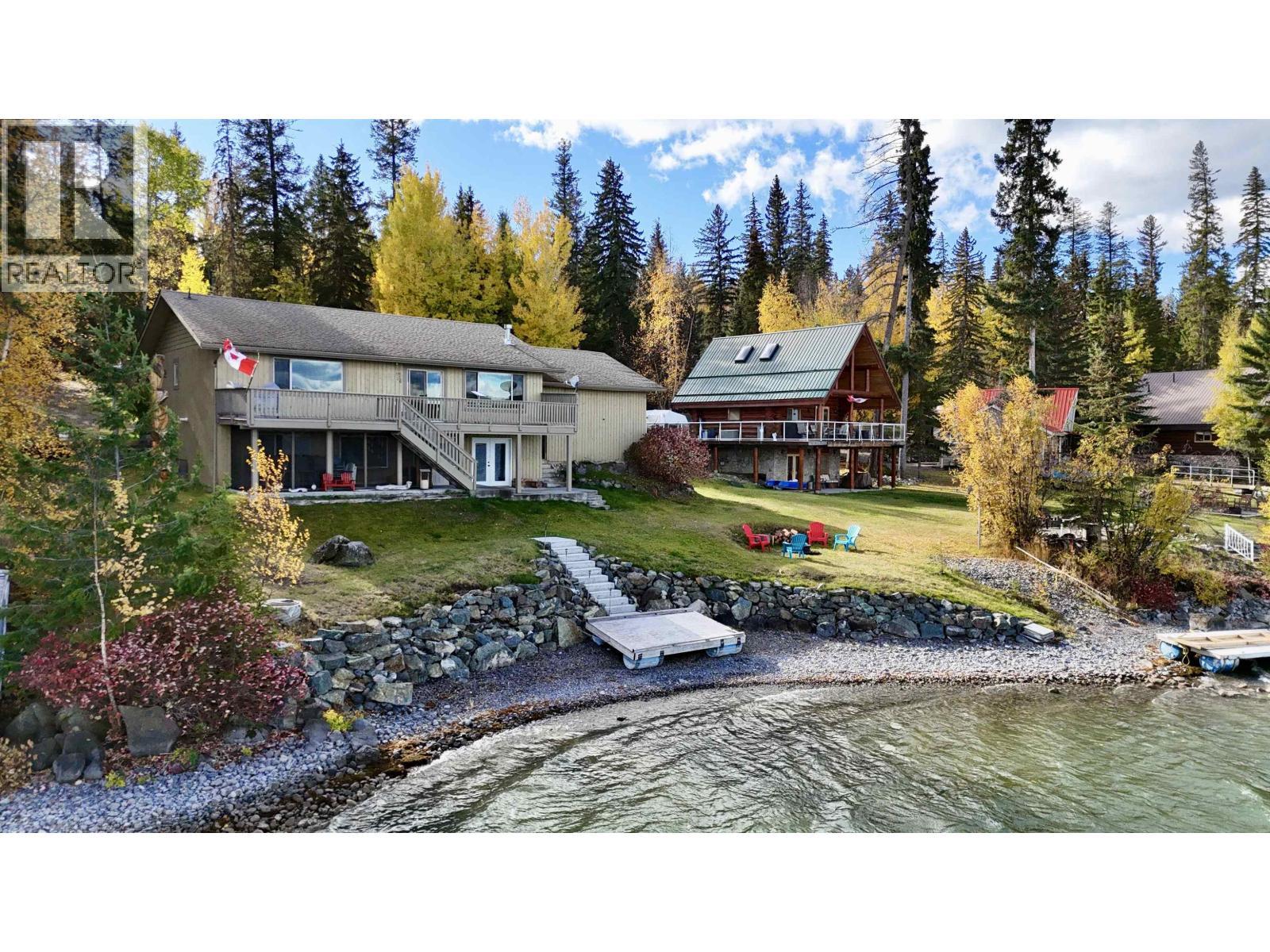 4635 Caverly Road, Lac La Hache, BC - Outdoor With Body Of Water With Deck Patio Veranda