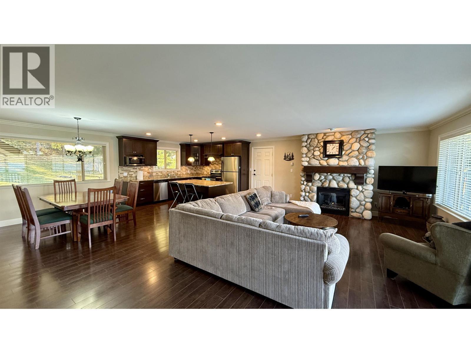 4635 Caverly Road, Lac La Hache, BC - Indoor Photo Showing Living Room With Fireplace
