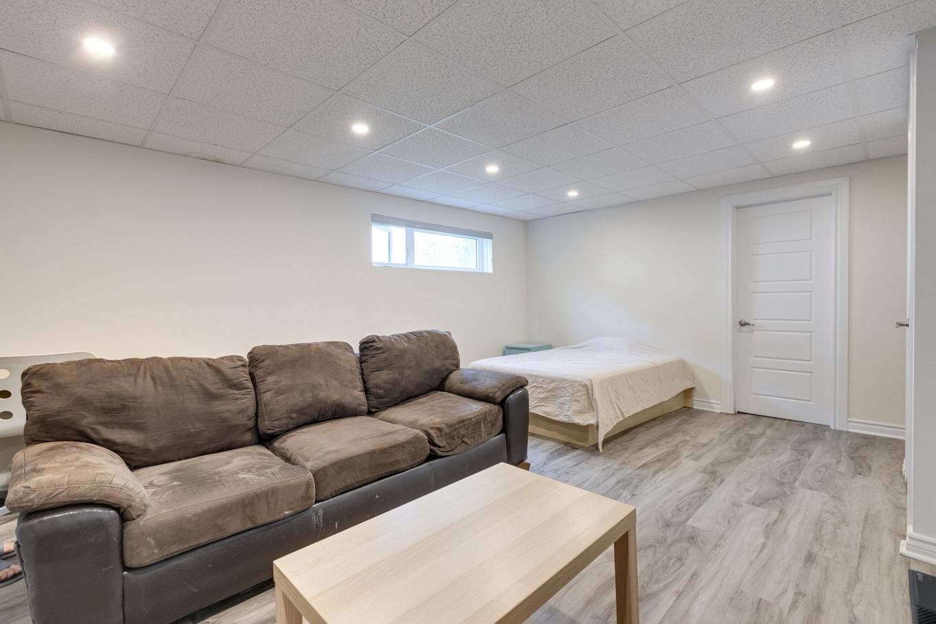 Salle familiale - 12240 Av. Salk, Montréal (Montréal-Nord), QC - Indoor Photo Showing Basement