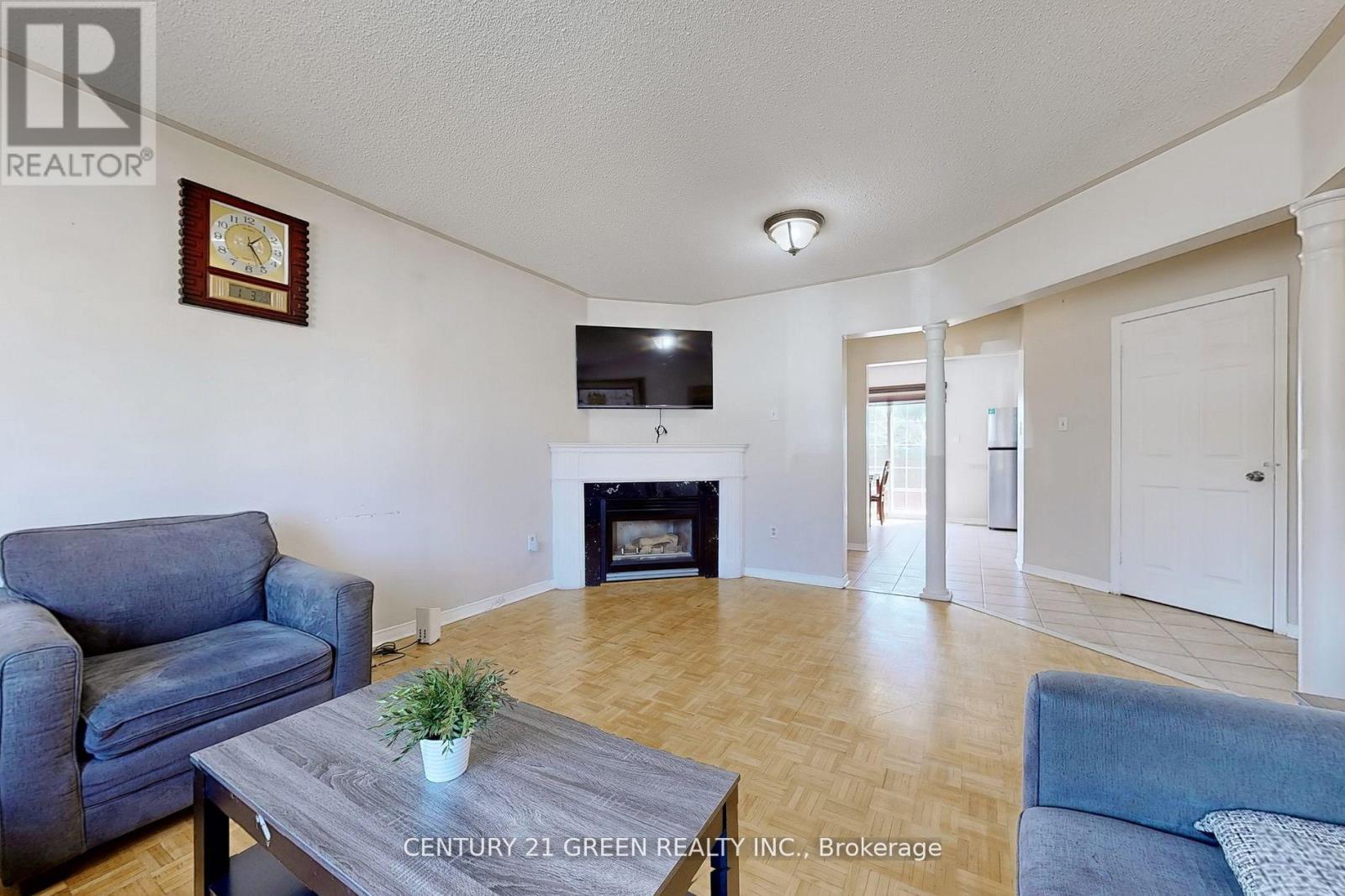 26 Dolphin Song Crescent, Brampton, ON - Indoor Photo Showing Living Room With Fireplace