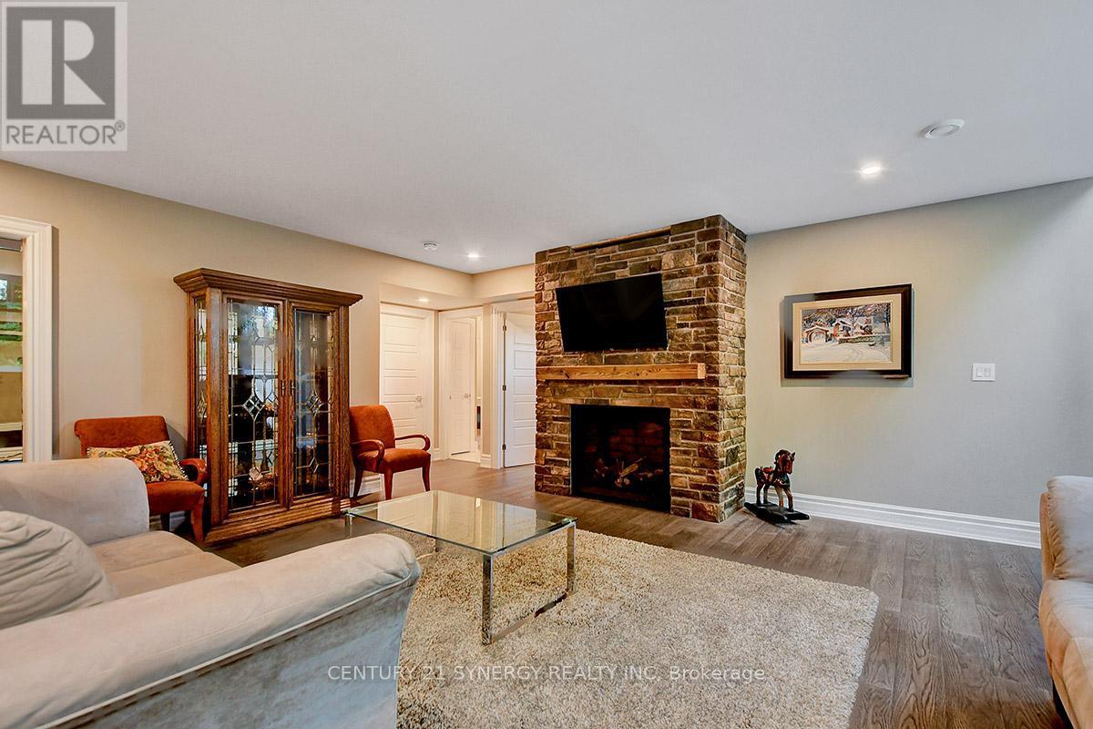 1443 Duchess Crescent, Ottawa, ON - Indoor Photo Showing Living Room With Fireplace