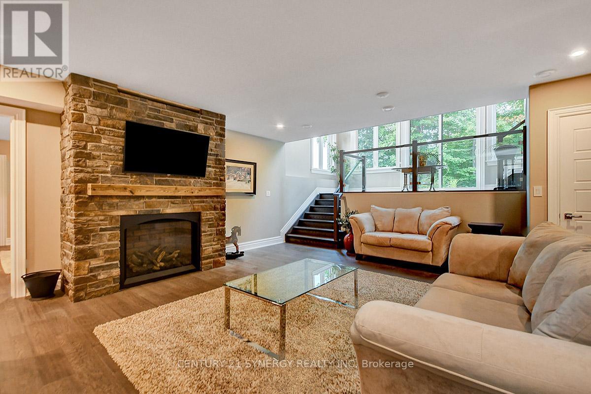 1443 Duchess Crescent, Ottawa, ON - Indoor Photo Showing Living Room With Fireplace