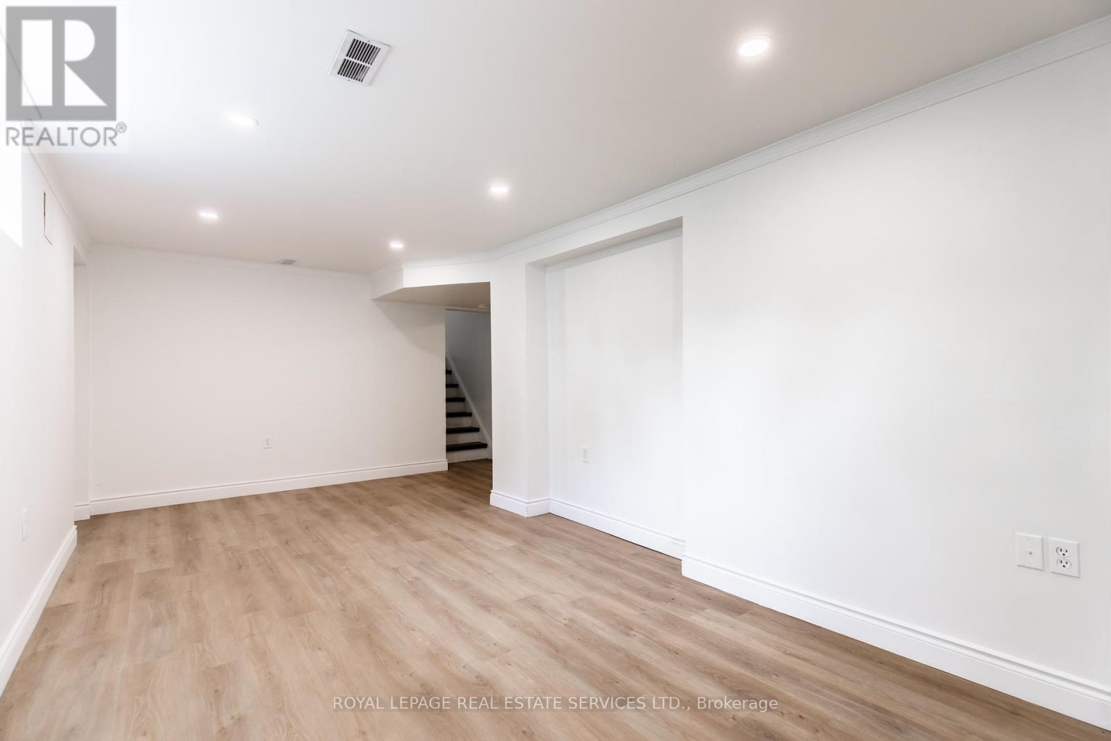 Lower level recreation room w/potlights - Unit #2 - 227 Lakeshore Road W, Oakville, ON - Indoor Photo Showing Other Room