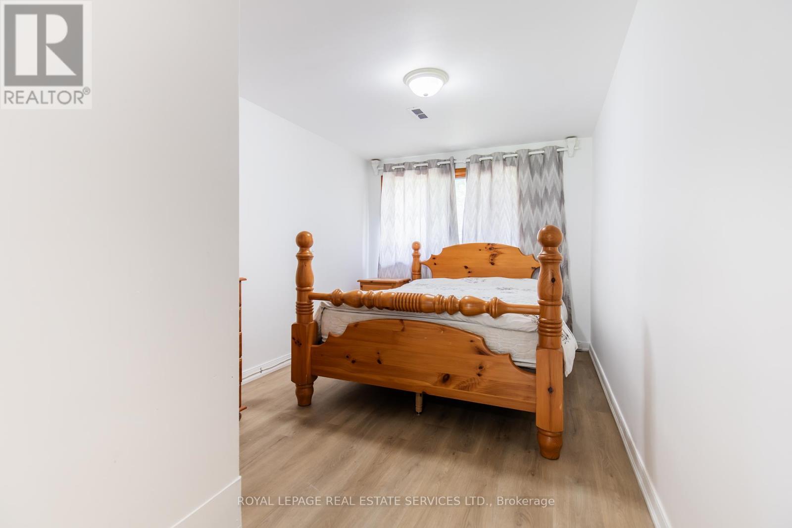 Bedroom on main level - Unit #2 - 227 Lakeshore Road W, Oakville, ON - Indoor Photo Showing Bedroom