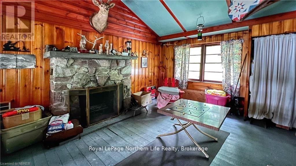 Pcl 16569 Burnt Island, West Nipissing (North Monetville), ON - Indoor Photo Showing Living Room With Fireplace