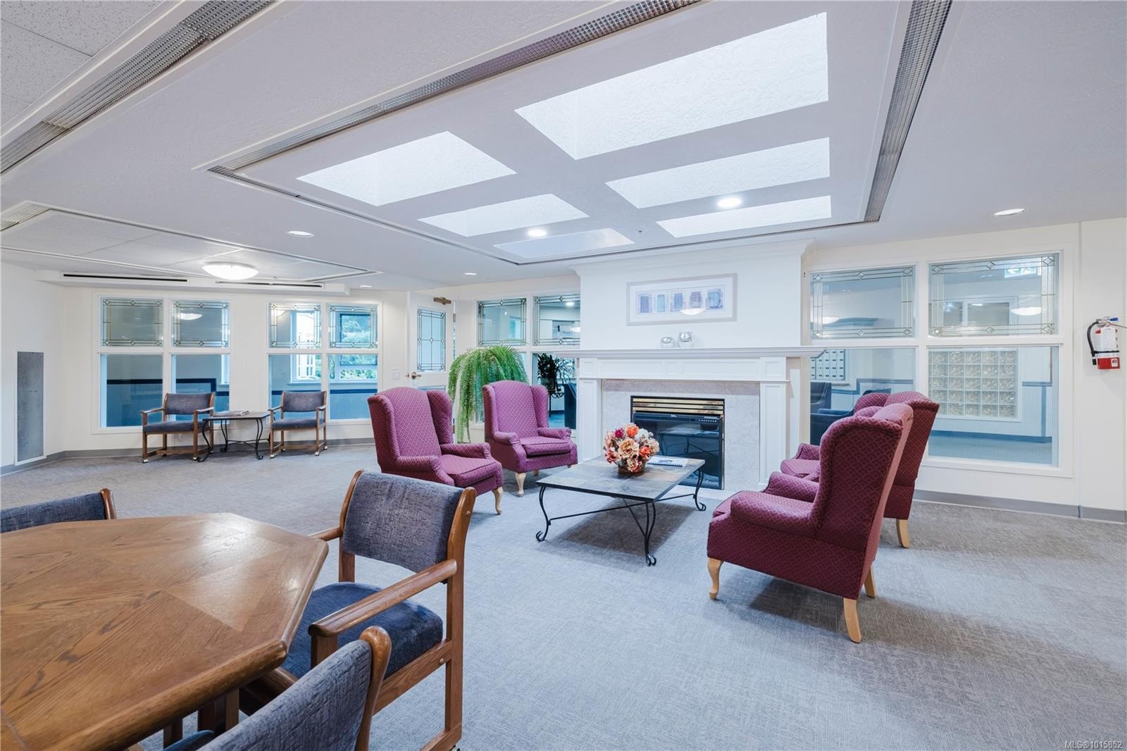 305-1521 Church Ave, Saanich, BC - Indoor With Fireplace