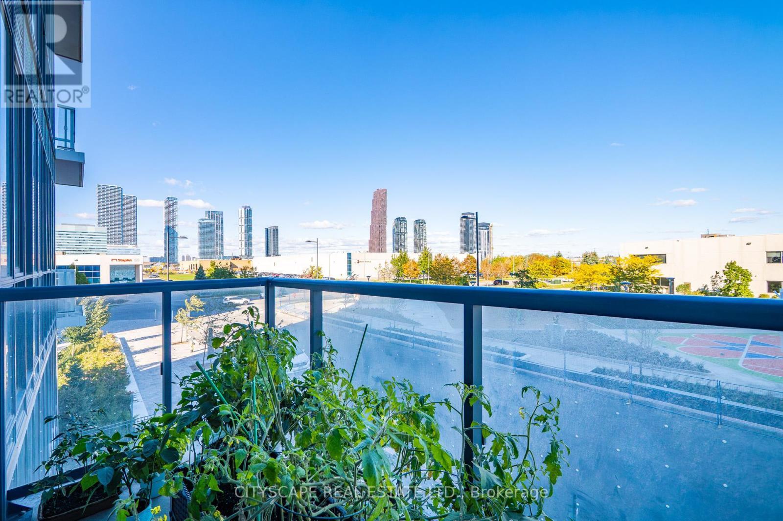 210 - 60 Honeycrisp Crescent, Vaughan, ON - Outdoor With Balcony