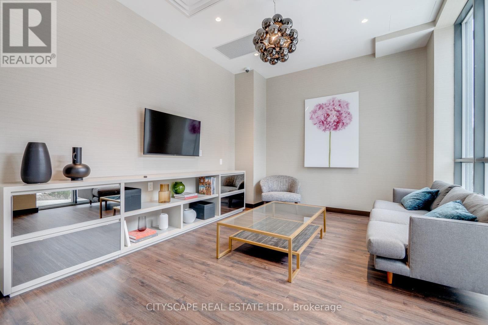 210 - 60 Honeycrisp Crescent, Vaughan, ON - Indoor Photo Showing Living Room