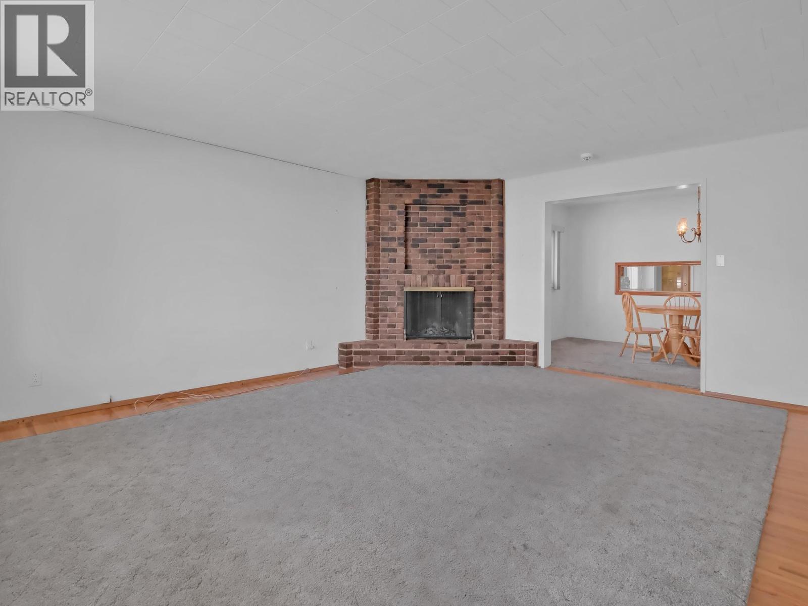 312 Scott Avenue, Penticton, BC - Indoor Photo Showing Other Room With Fireplace