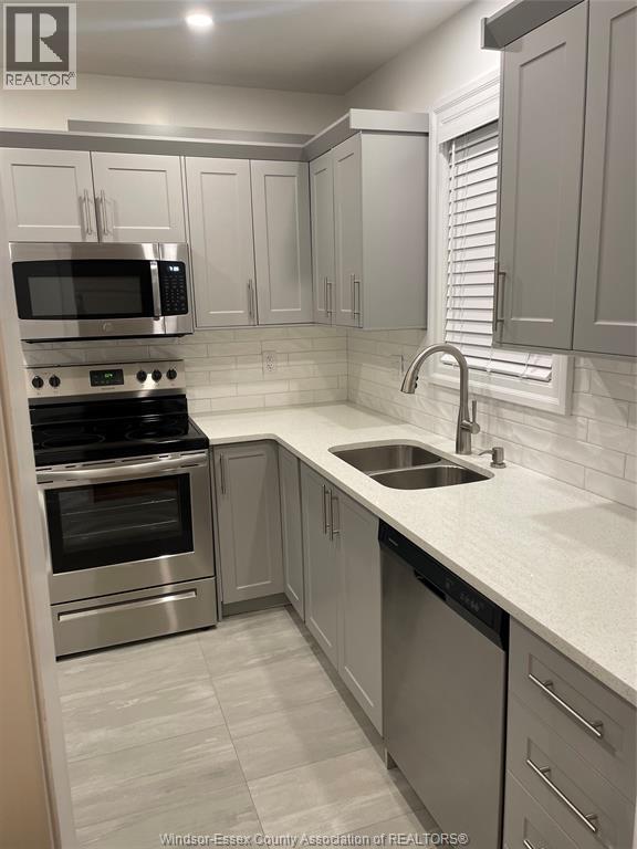 1496/1498 Giles East Unit# Upper, Windsor, ON - Indoor Photo Showing Kitchen With Stainless Steel Kitchen With Double Sink With Upgraded Kitchen