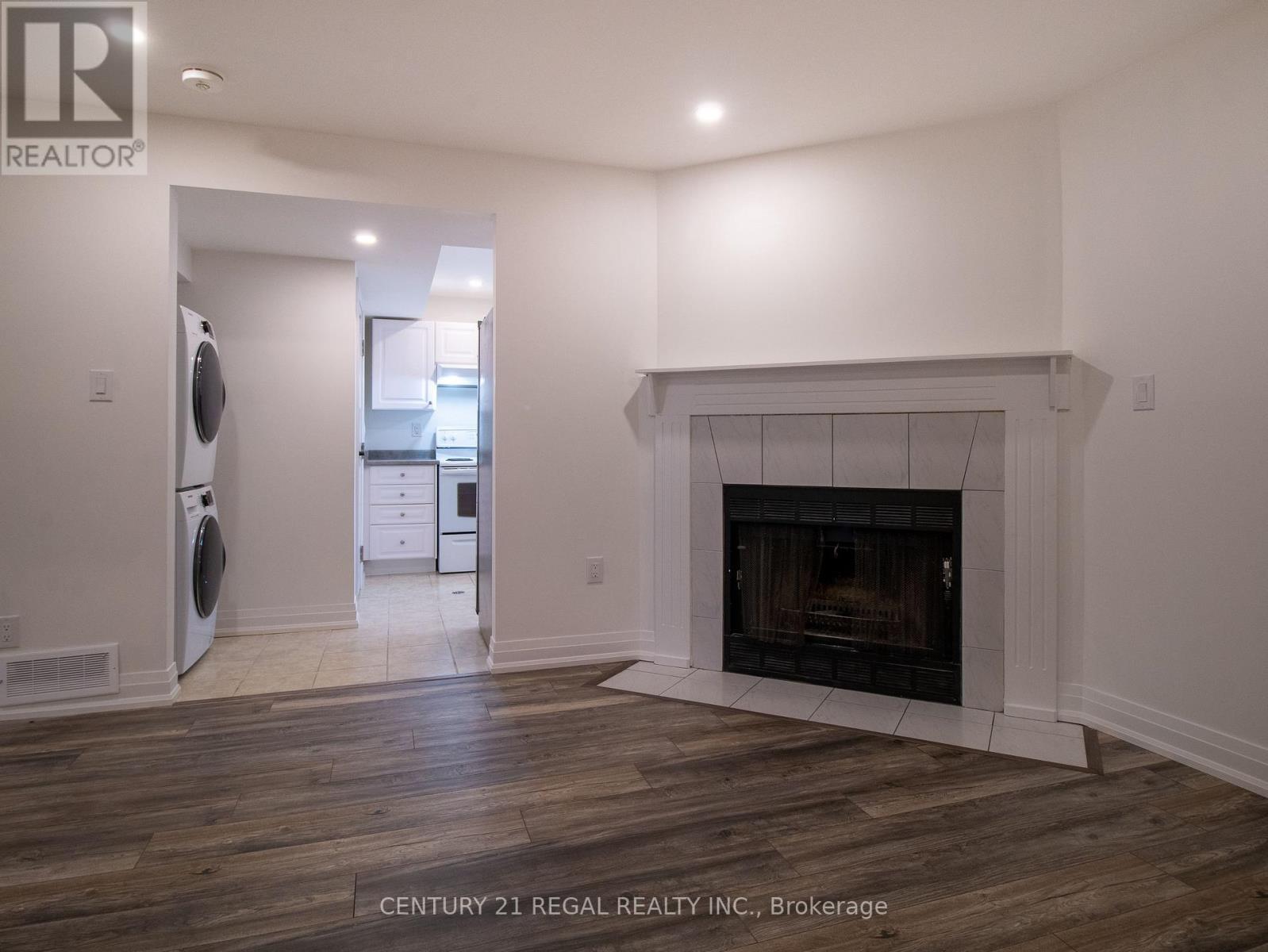 Lower - 47 Limestone Crescent, Whitby, ON - Indoor Photo Showing Living Room With Fireplace