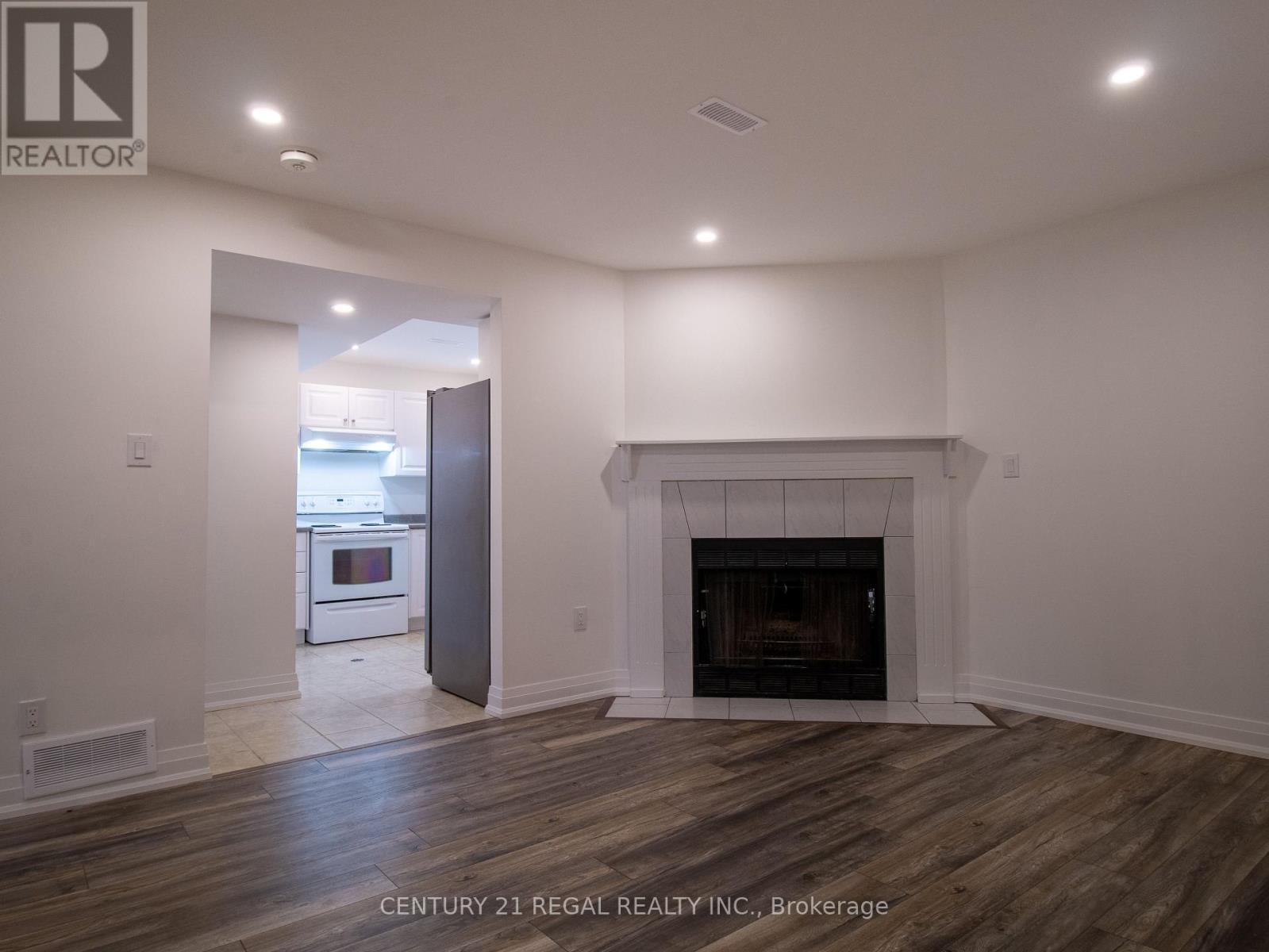 Lower - 47 Limestone Crescent, Whitby, ON - Indoor Photo Showing Living Room With Fireplace