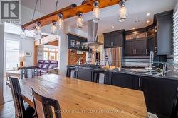 Open living, dining + kitchen -