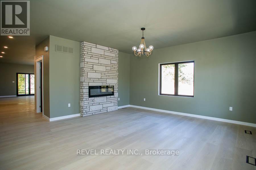 7 Scott Drive, Norfolk, ON - Indoor With Fireplace