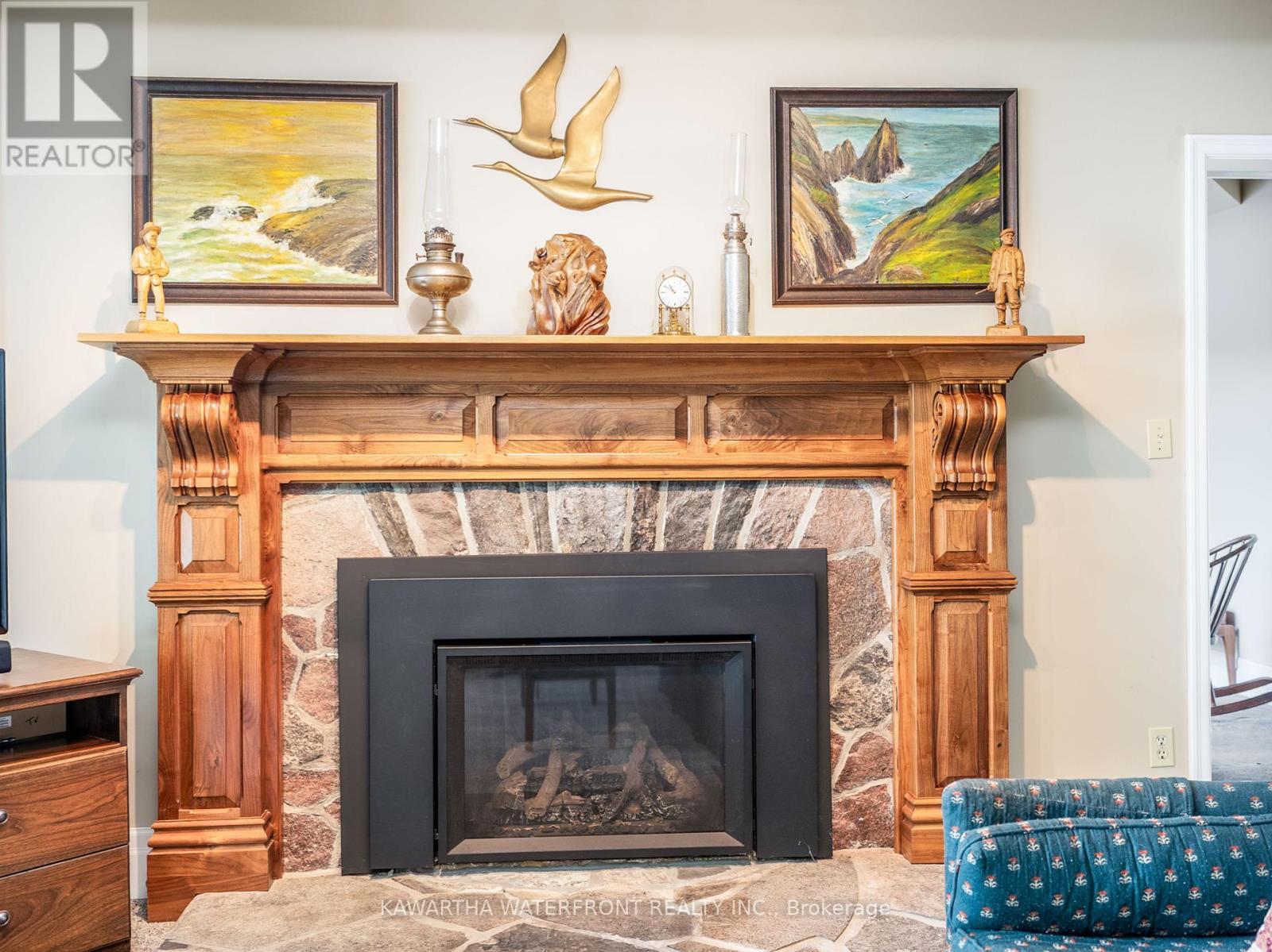 Propane Fireplace - 31 Shadow Lake 40 Road, Kawartha Lakes (Somerville), ON - Indoor Photo Showing Living Room With Fireplace