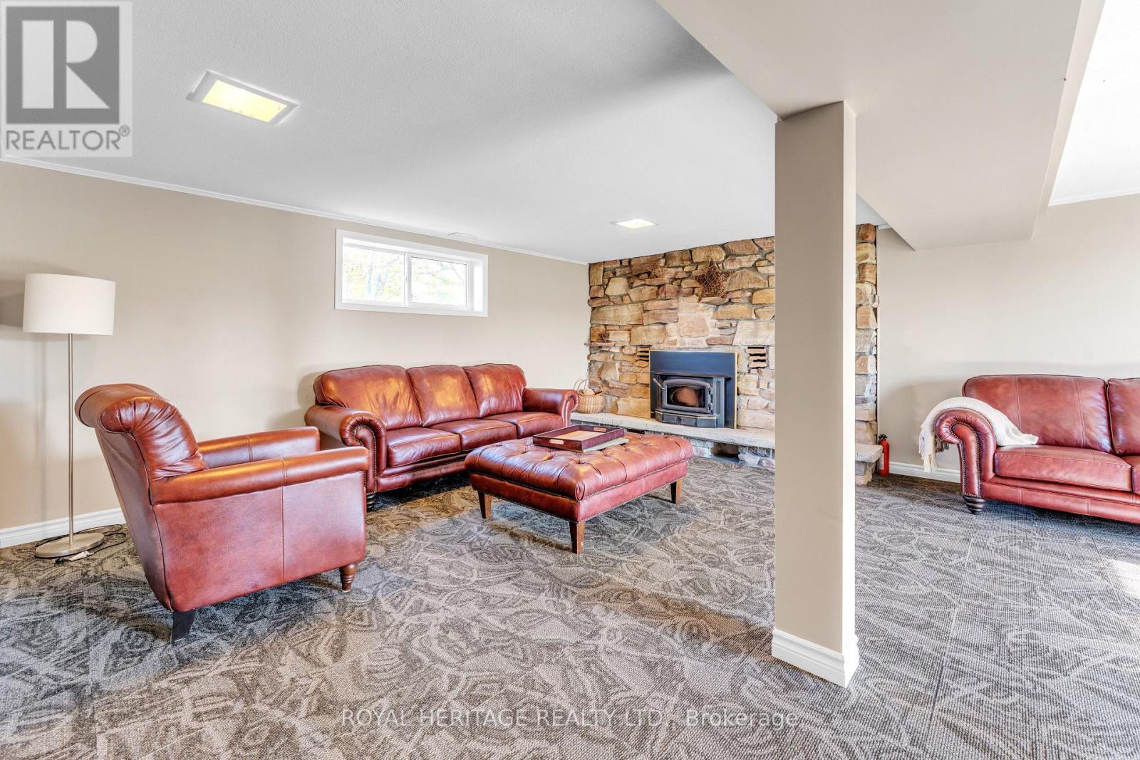589 County 2 Road, Front Of Leeds & Seeleys Bay, ON - Indoor Photo Showing Living Room With Fireplace