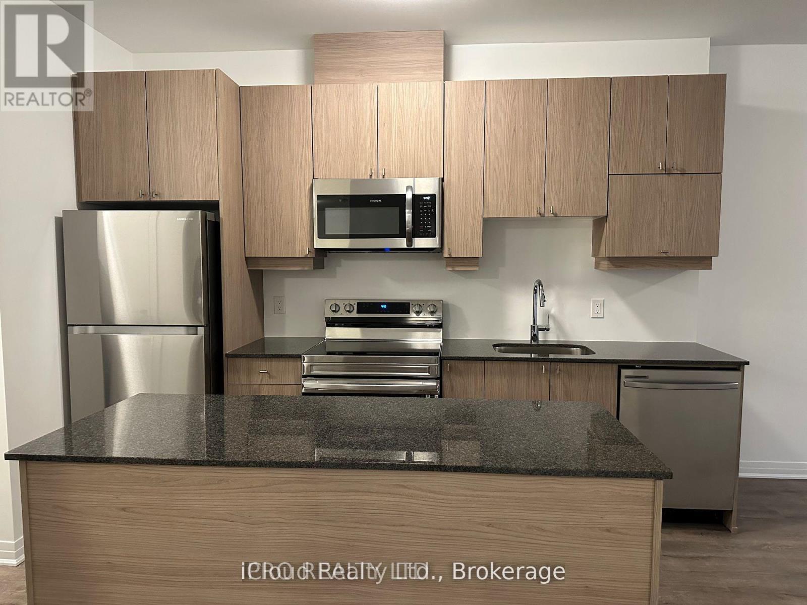 103 - 460 Gordon Krantz Avenue, Milton, ON - Indoor Photo Showing Kitchen With Upgraded Kitchen