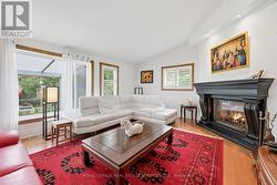 Family Room with Vaulted Ceiling & Gas Fireplace -