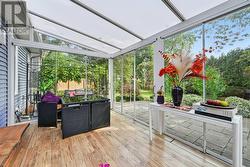 Three-Season Glass Sunroom off Family Room -