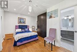 Primary Bedroom with Two Custom Built-In Wardrobes -