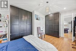 Primary Bedroom with Two Custom Built-In Wardrobes -