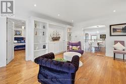 Living Room w/Custom Cabinetry & Display Shelving -