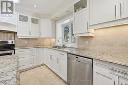 Stunning Gourmet Kitchen Features S/S Appliances -