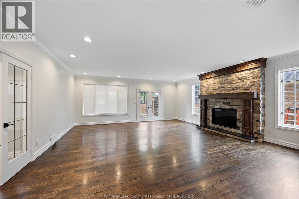 15 Fasan Crescent, Tecumseh, ON - Indoor Photo Showing Living Room With Fireplace